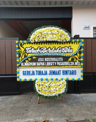 Papan Bunga Duka di Koto Dian